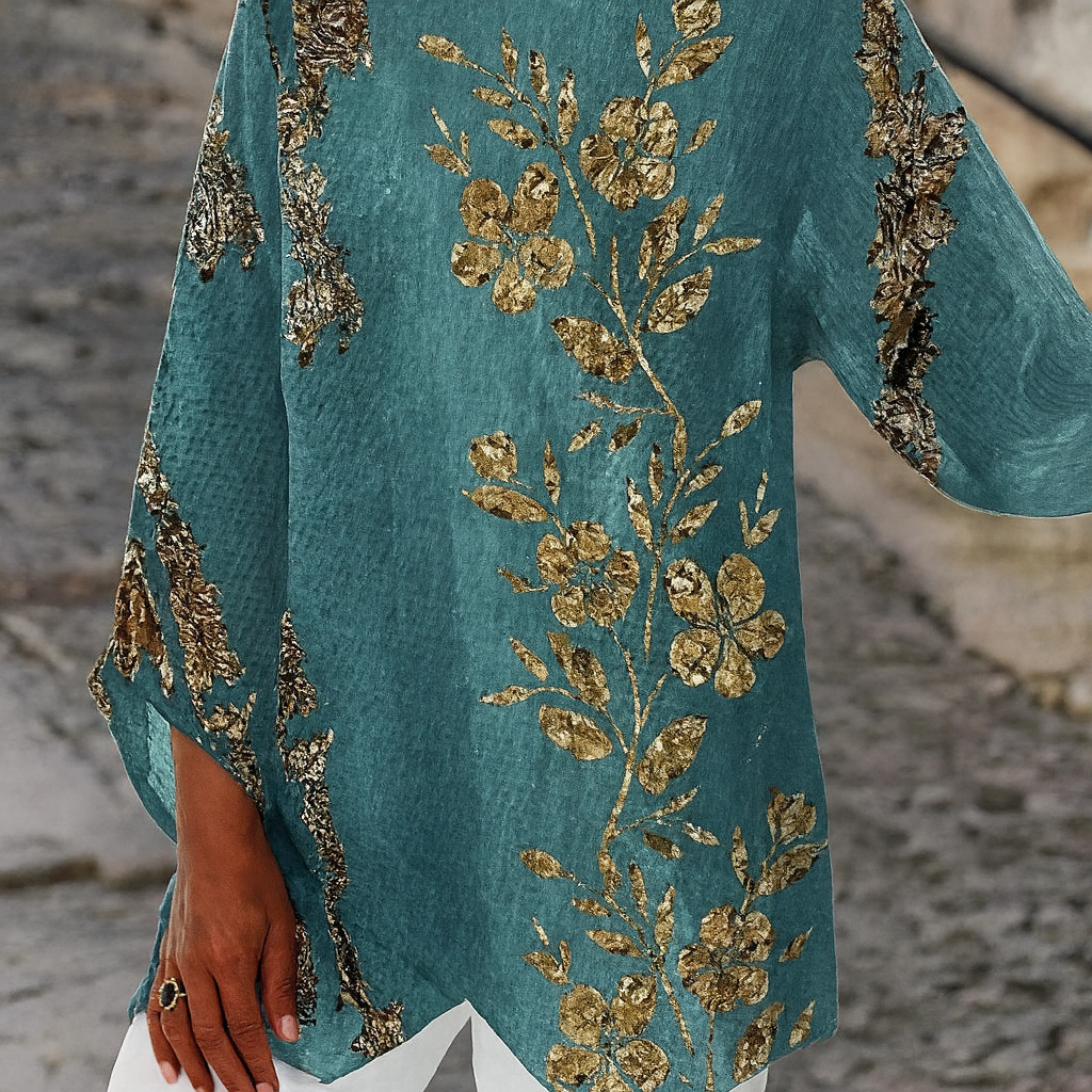 Gouden blouse met lange mouwen en bloemenprint – casual elegantie met vrouwelijke artisticiteit
