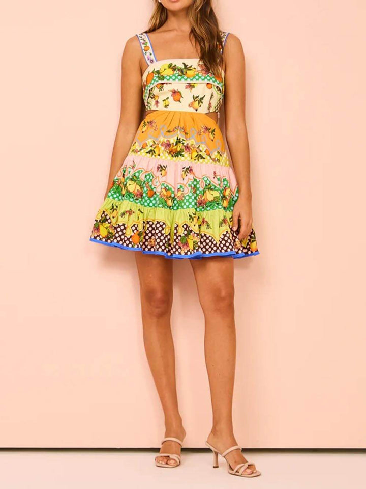 Korte jurk met fruitprint en speelse stroken