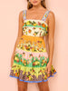 Korte jurk met fruitprint en speelse stroken