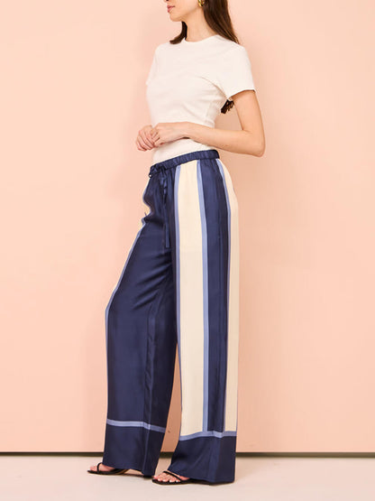 Broek met contrasterende biezen