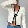 Chique vest met zwarte bies