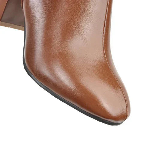 Dameslaarzen met hak en rits, kniehoog. Elegant design gecombineerd met dagelijks comfort.