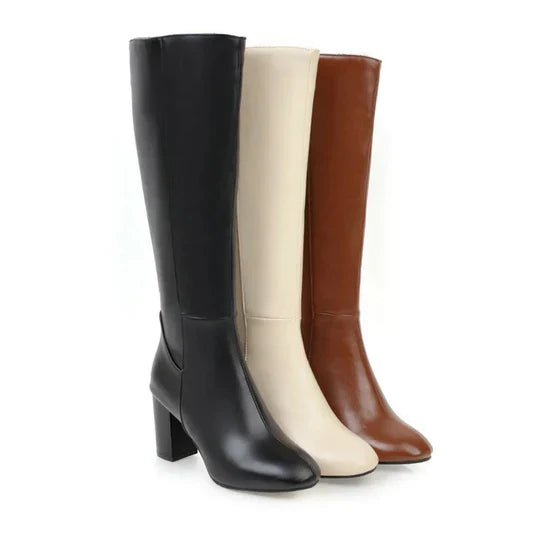 Dameslaarzen met hak en rits, kniehoog. Elegant design gecombineerd met dagelijks comfort.