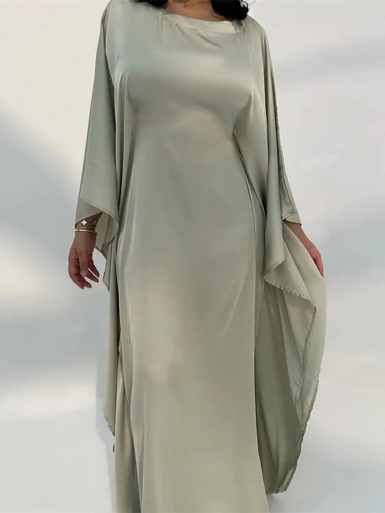Elegante maxi-jurk met spaghettibandjes en hoge split