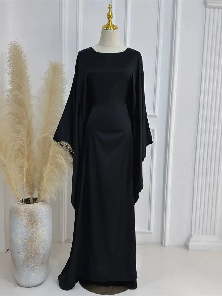 Elegante maxi-jurk met spaghettibandjes en hoge split