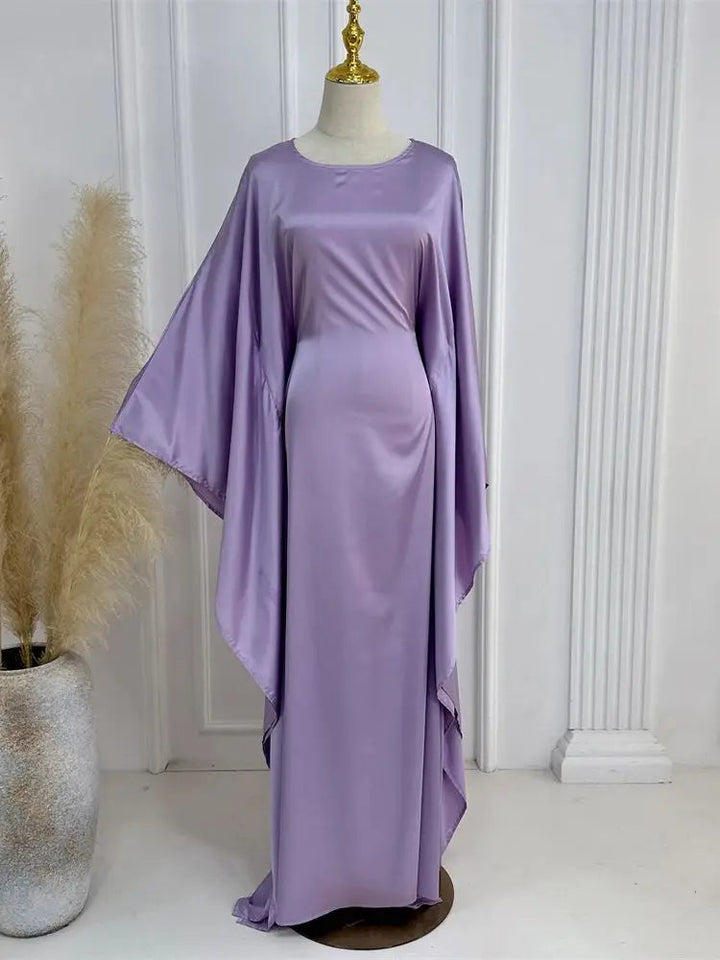 Elegante maxi-jurk met spaghettibandjes en hoge split