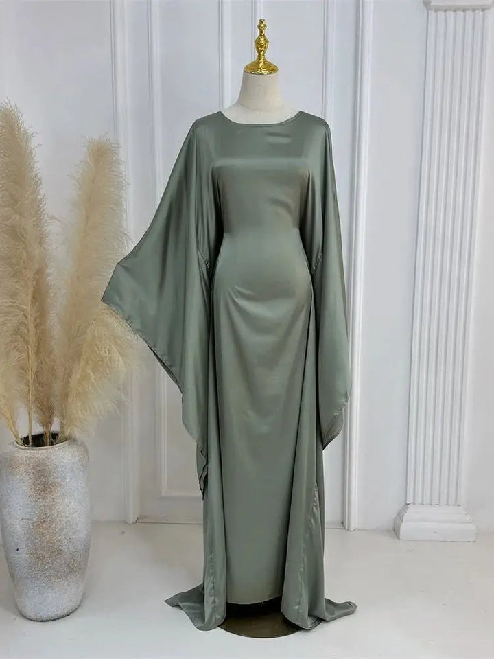 Elegante maxi-jurk met spaghettibandjes en hoge split