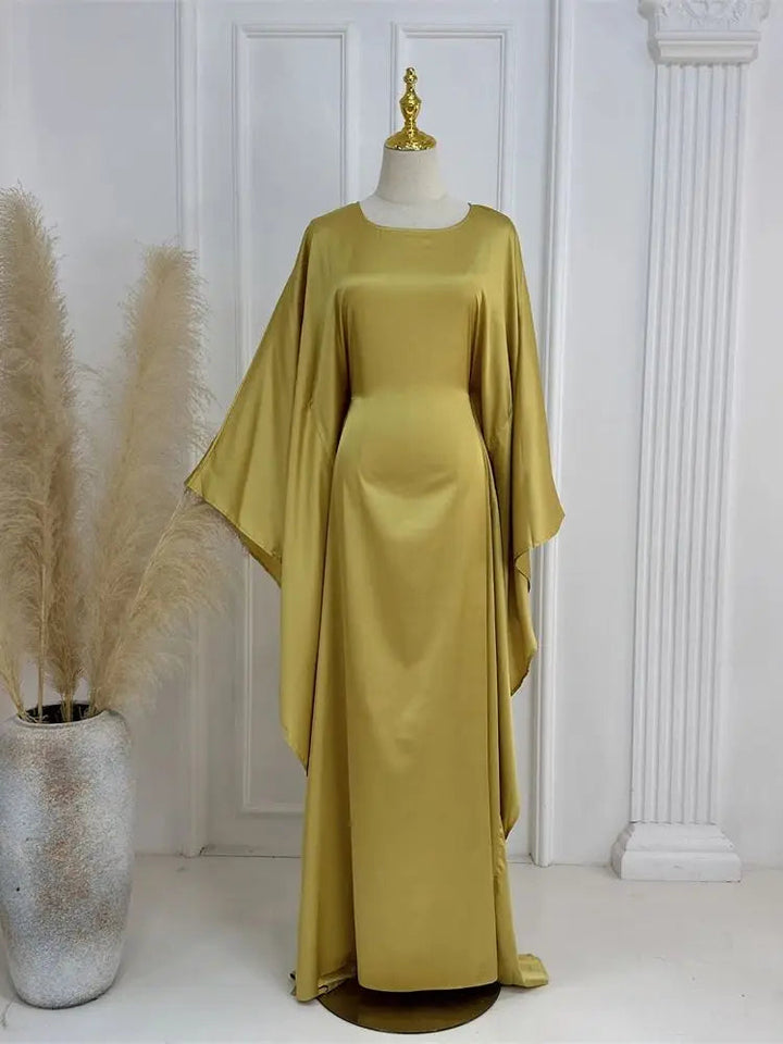 Elegante maxi-jurk met spaghettibandjes en hoge split