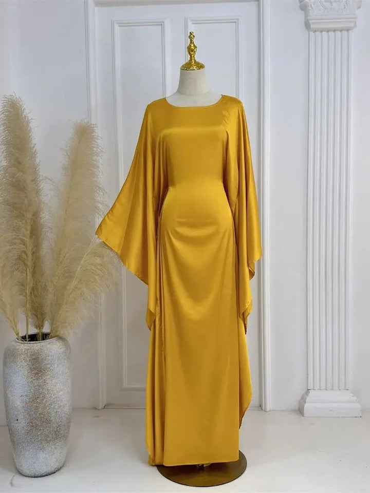 Elegante maxi-jurk met spaghettibandjes en hoge split