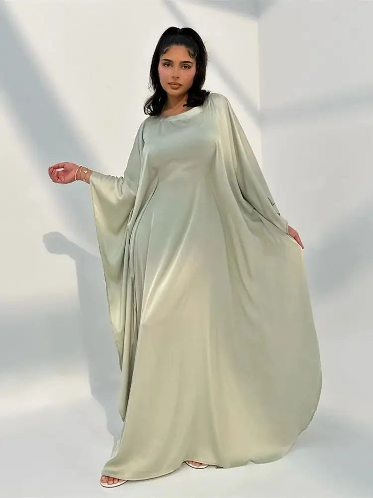 Elegante maxi-jurk met spaghettibandjes en hoge split