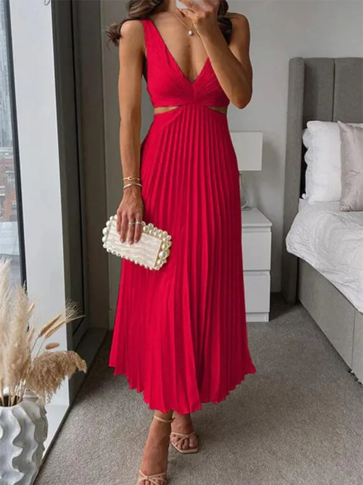Elegante mouwloze jurk met open rug. Sierlijke verfijning voor gelegenheden bij warm weer.