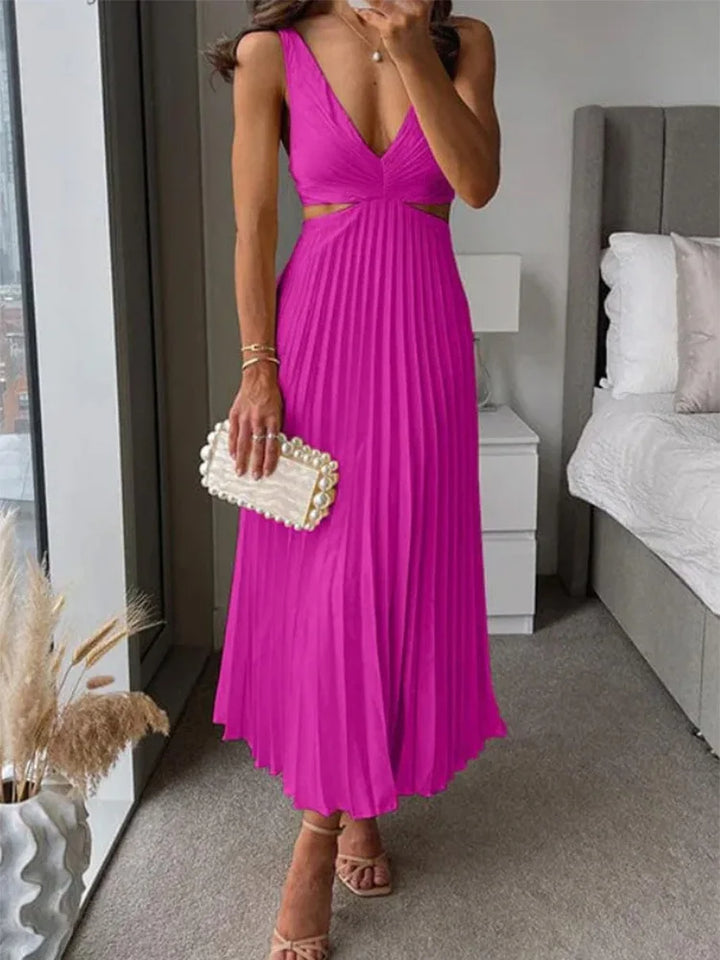 Elegante mouwloze jurk met open rug. Sierlijke verfijning voor gelegenheden bij warm weer.