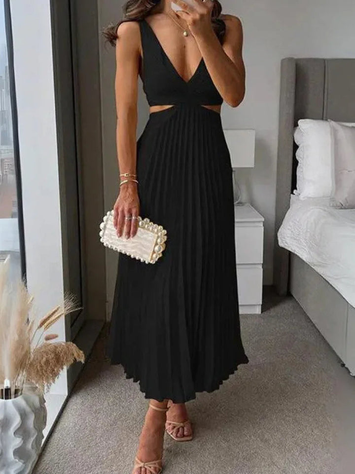 Elegante mouwloze jurk met open rug. Sierlijke verfijning voor gelegenheden bij warm weer.