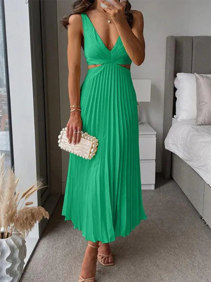 Elegante mouwloze jurk met open rug. Sierlijke verfijning voor gelegenheden bij warm weer.