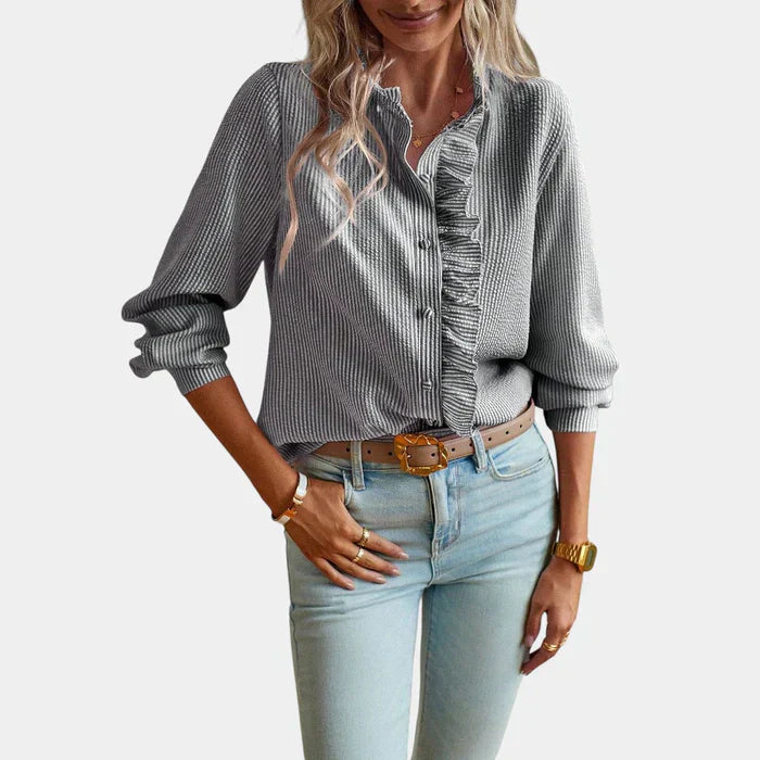 Gestreepte damesblouse met ruches en elegante knoopsluiting