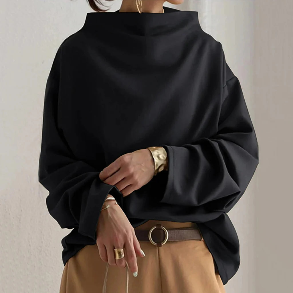 Minimalistische losvallende top Tijdloze eenvoud met alledaags comfort