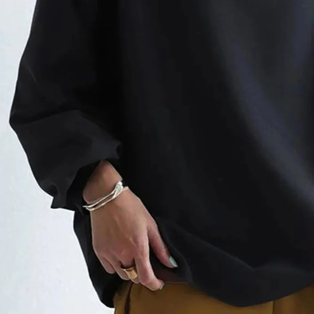Minimalistische losvallende top Tijdloze eenvoud met alledaags comfort