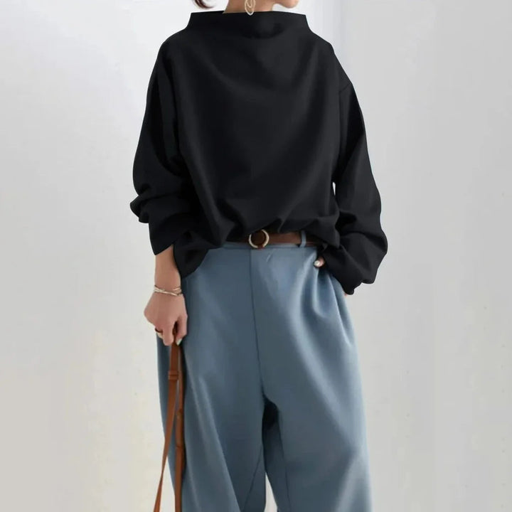 Minimalistische losvallende top Tijdloze eenvoud met alledaags comfort