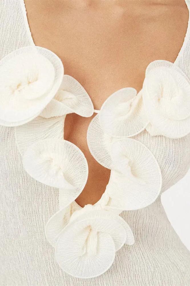 Elegante Geribbelde Jurk met Bloemdetails