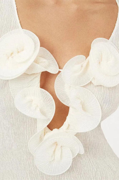 Elegante Geribbelde Jurk met Bloemdetails